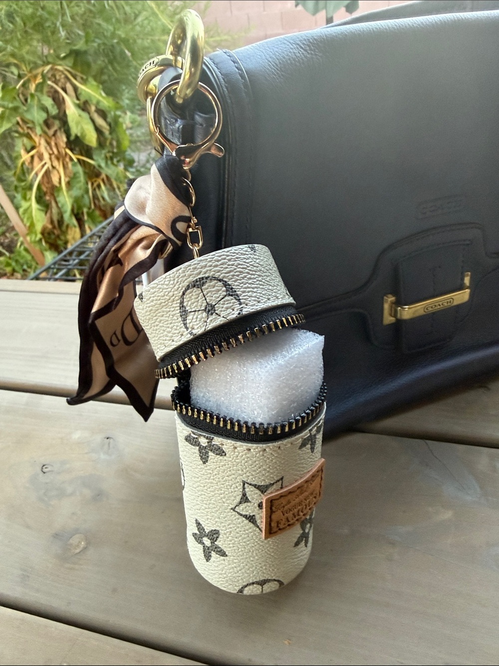 Vogue Ivory and Black Monogram Cylinder Keychain Pouch - Picture 3 of 7